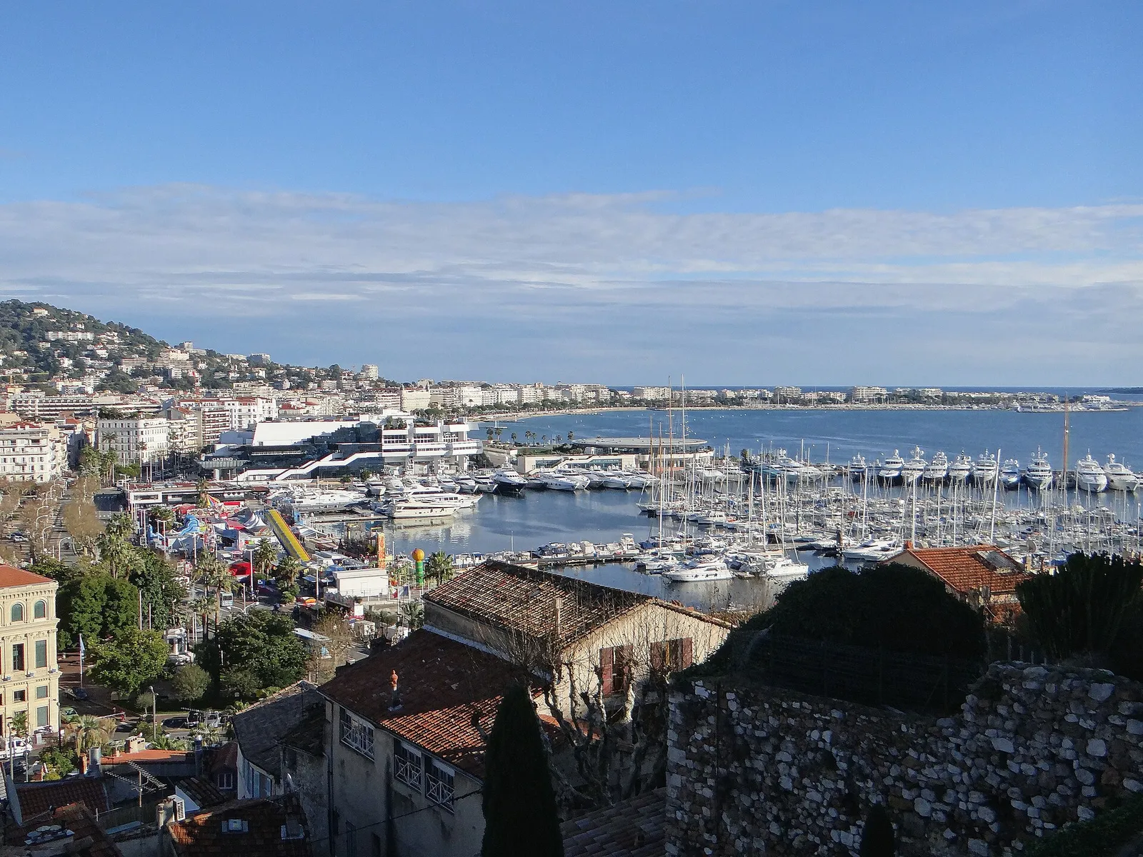 The bay of Cannes seen from the Suquet, with the marina and the Côte d'Azur coastline stretching away