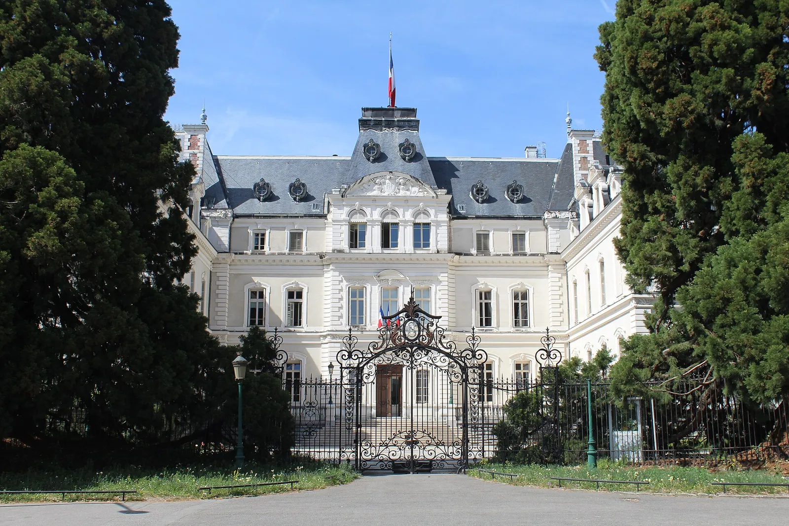 The prefecture building of Haute-Savoie in Annecy, behind an iron gate