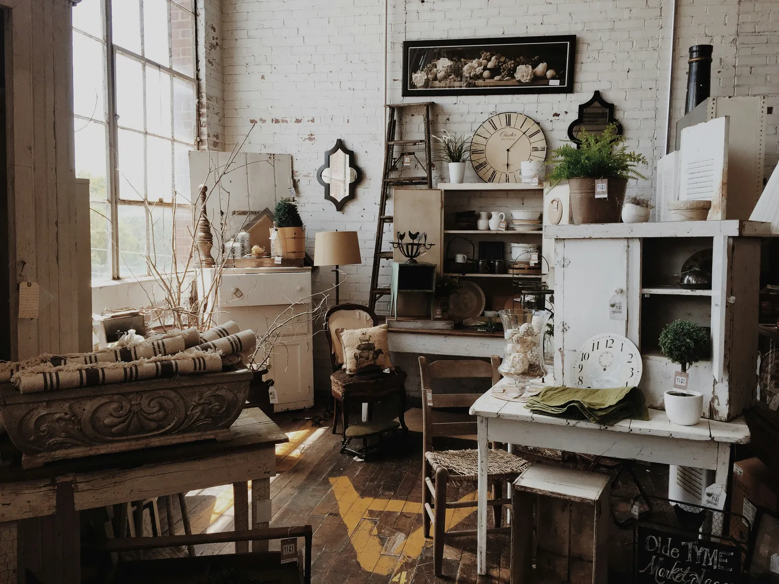 white wooden cabinet near table inside room, illustrating moving antiques